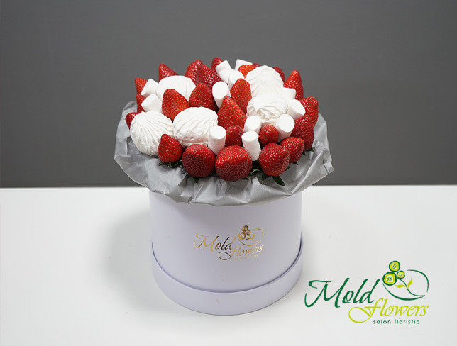 Box with strawberries and marshmallows photo